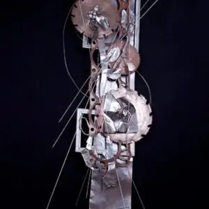 Abstract metal sculpture with gears and wires.