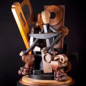 Stacked wooden rings and carved legs sculpture