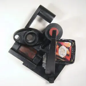 Abstract sculpture with industrial and colorful elements.