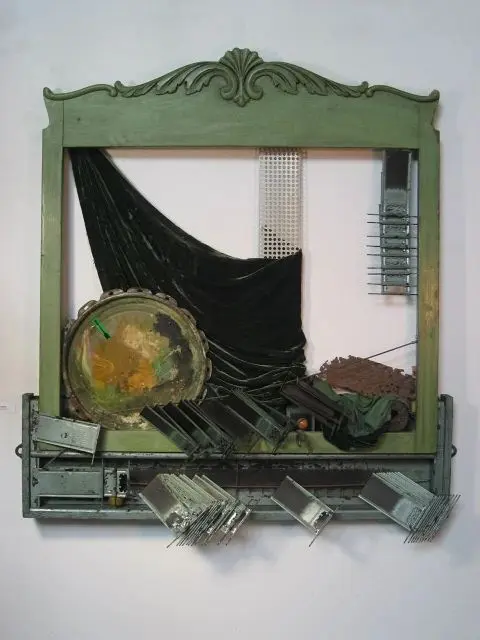 Green framed mixed media artwork with textures.