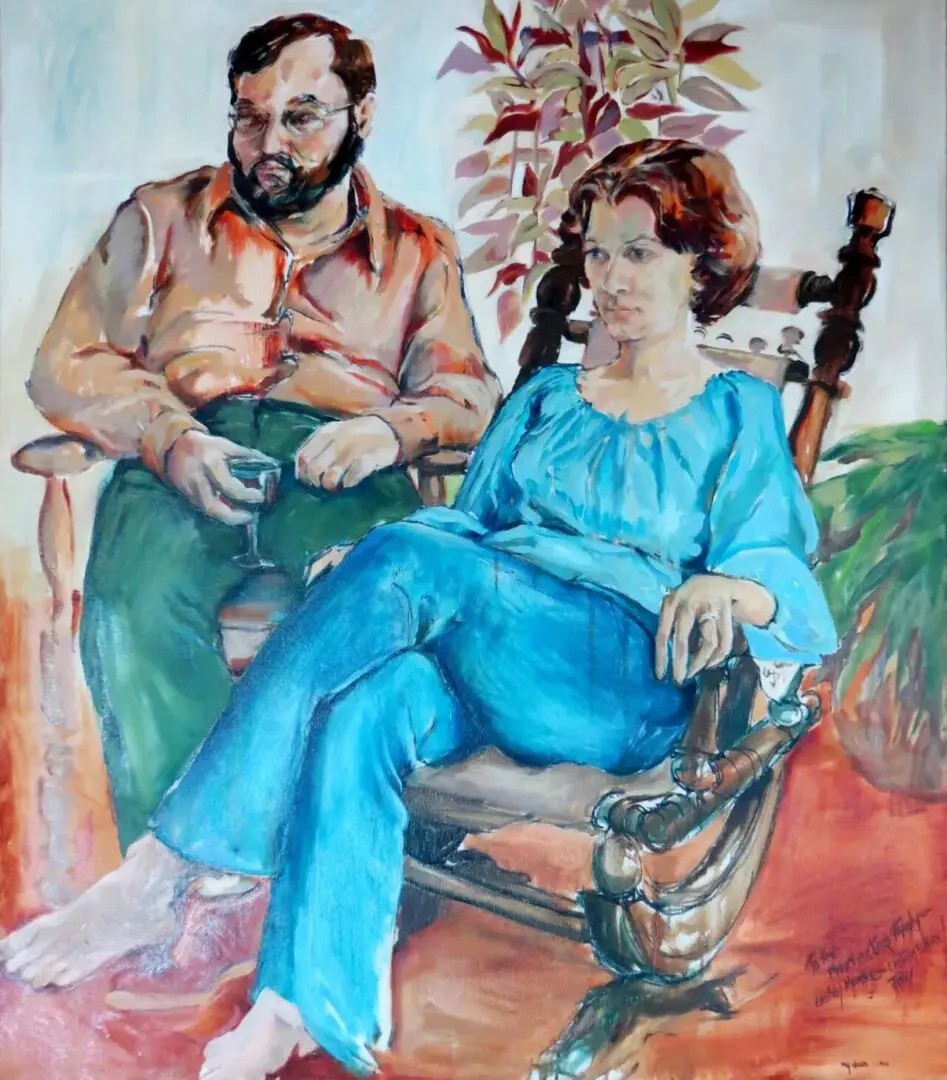 Man and woman seated in a painting.