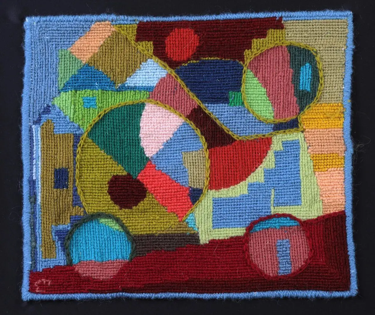 Abstract colorful geometric pattern on fabric.