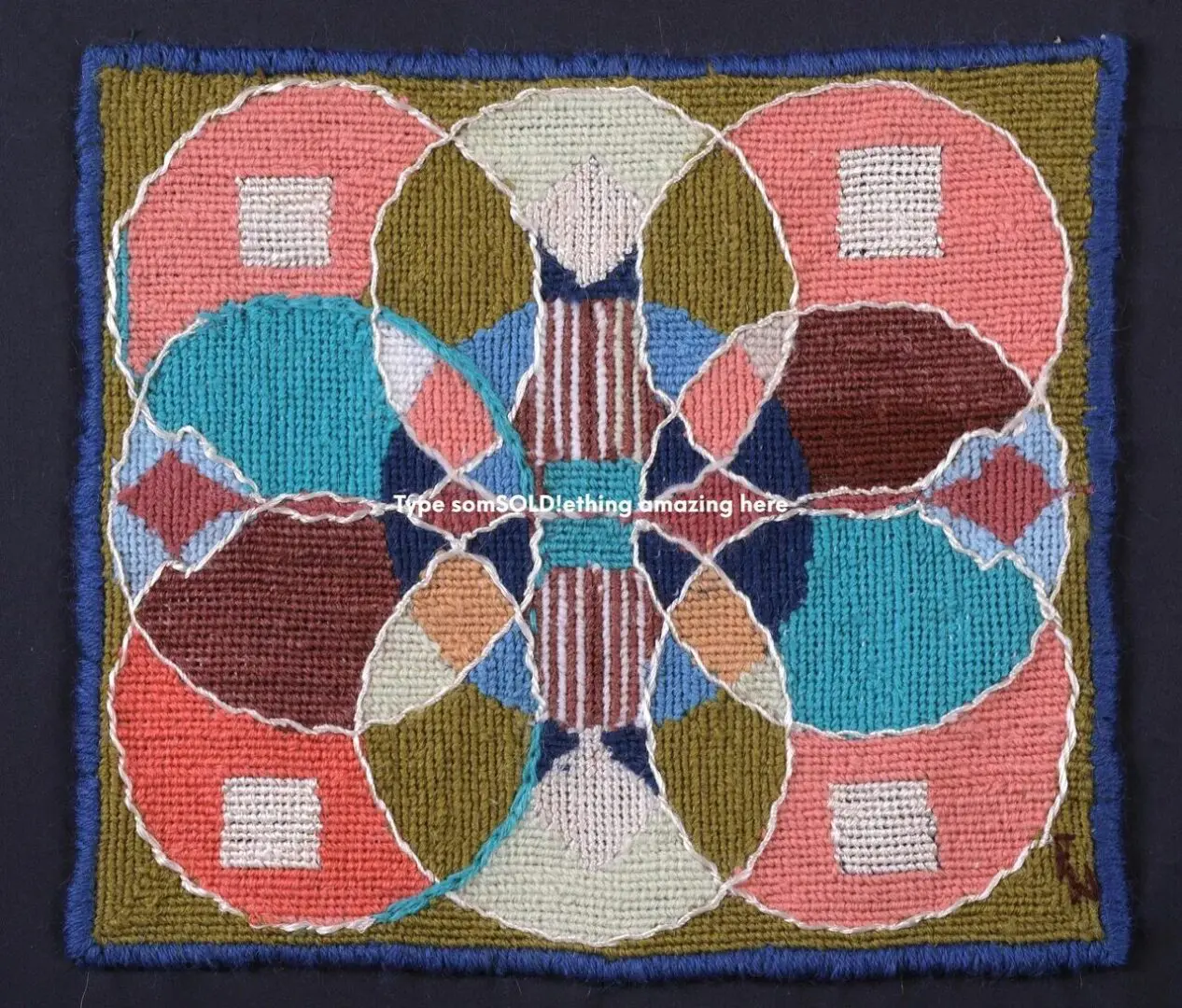 Colorful geometric pattern on woven textile.
