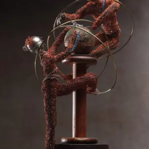 Abstract sculpture of a seated figure with tangled wires.