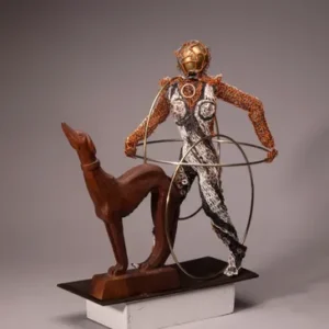 Diver sculpture with dog and hoops.