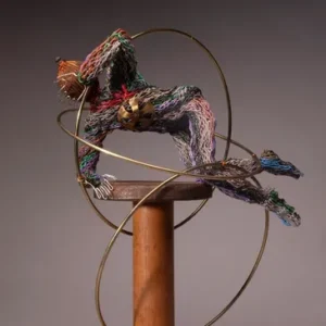 Colorful wire sculpture with golden hoops.
