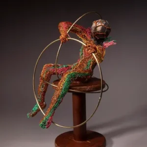 Wire sculpture of a figure with hoops.